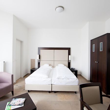 Burns Art Hotel Дюссельдорф Номер фото